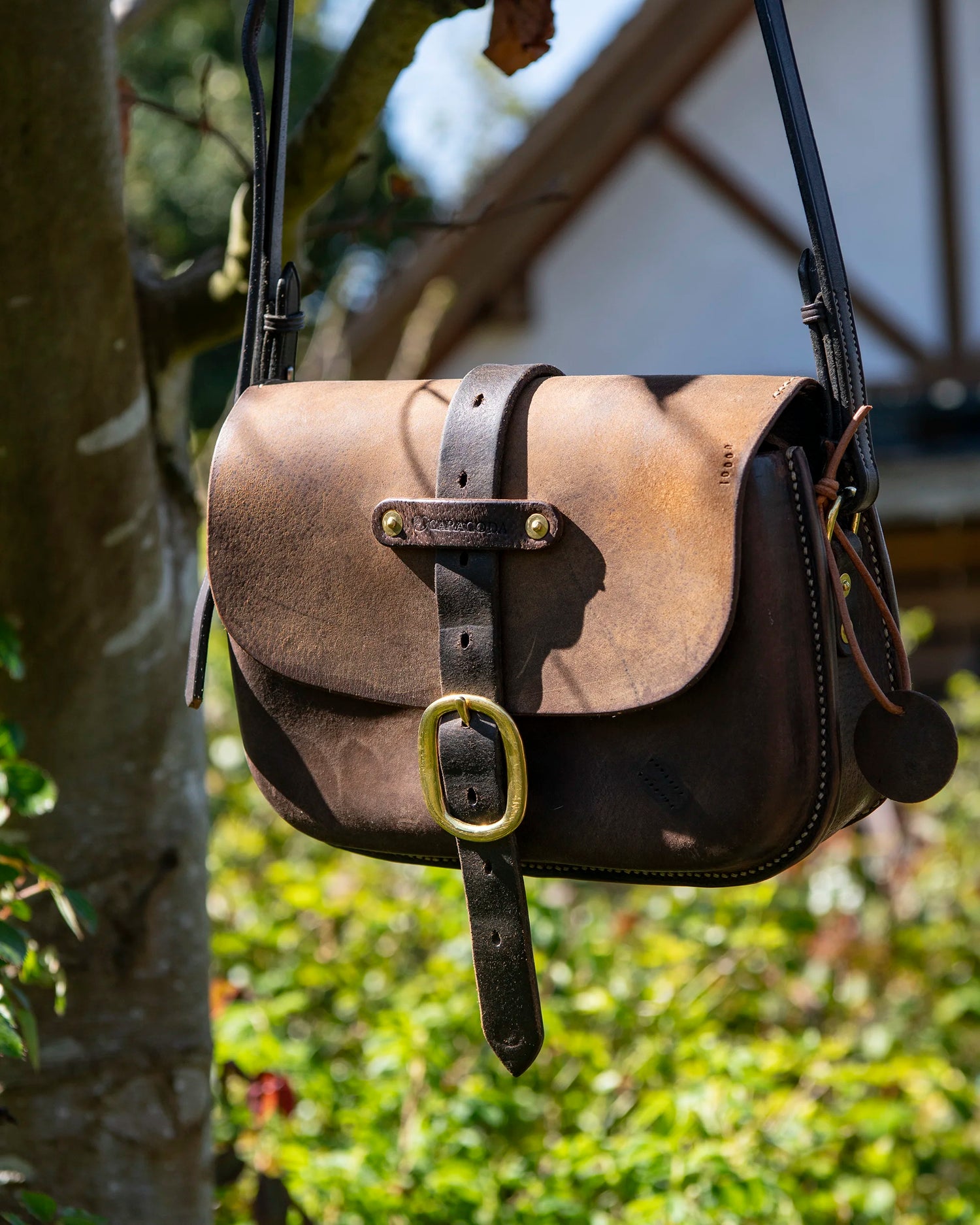 Repurposed Saddle Leather Crossbody Bag Wet moulded front