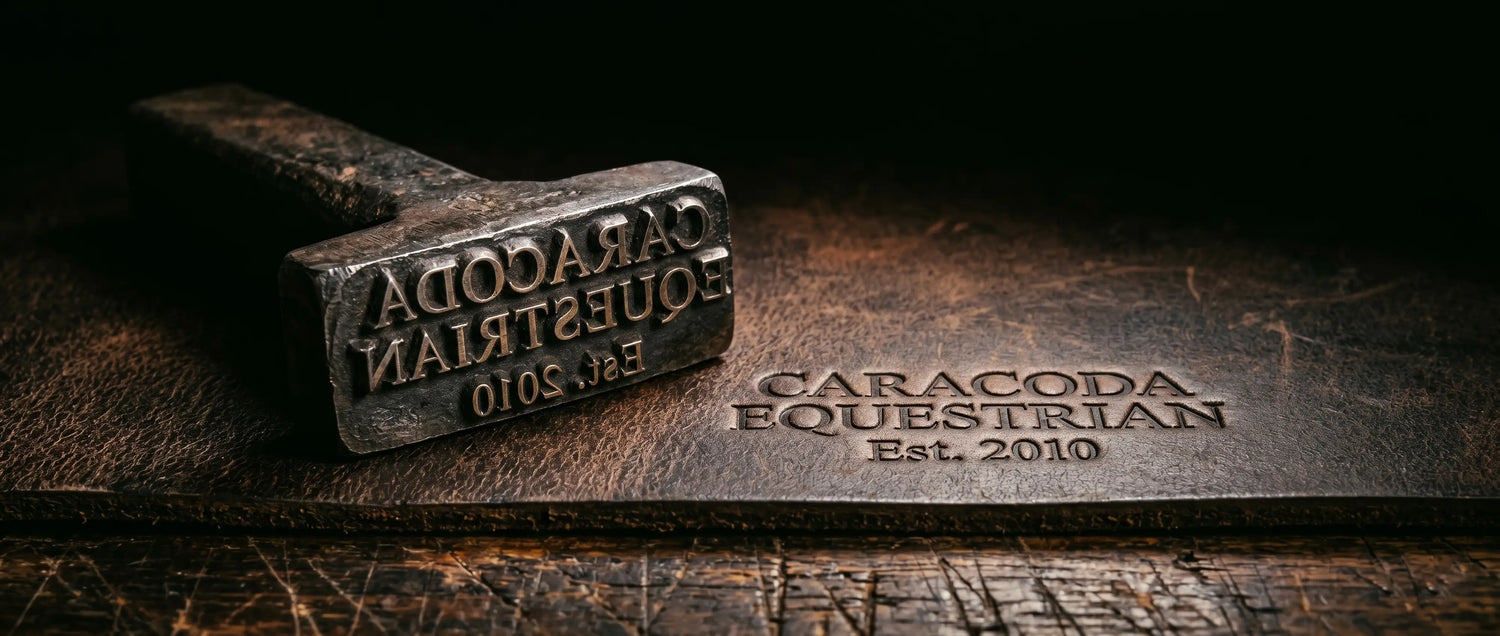 Bronze stamp with 'Caracoda Equestrian' branding on a dark background