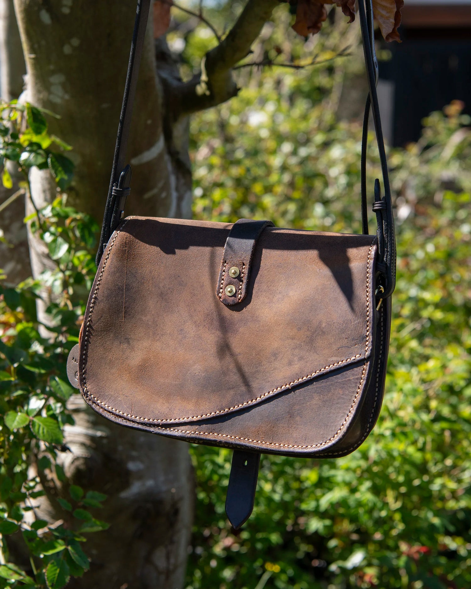 Repurposed Saddle Leather Crossbody Bag Wet moulded front